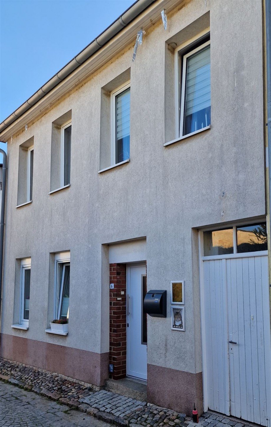 Stra�enfront mit Zugang Hof Reihenmittelhaus Neubukow