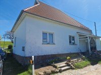 Bild (8a5419f98c873d8284300d2765a2bd85): Einfamilienhaus mit vermieteter Einliegerwohnung