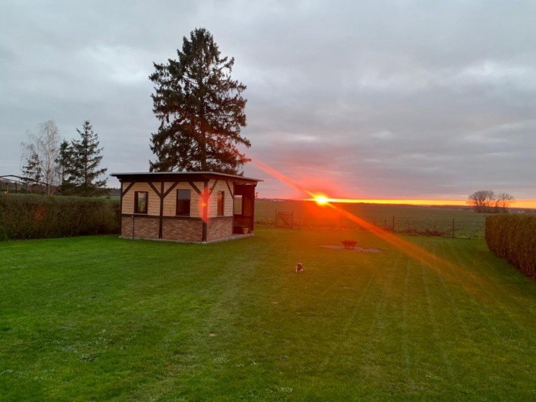 Garten Sonnenuntergang Bastorf Doppelhaush�lfte Ein Haus - viele M�glichkeiten: Wohnen und Ferienvermietung in Ostseen�he