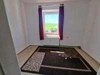 Bild (d1affbdce62aa7f5fb2af861f03d0424): Einfamilienhaus mit vermieteter Einliegerwohnung
